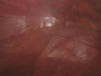 Так выглядим пол из керамогранита «Goldeneye» тёмно-красного цвета